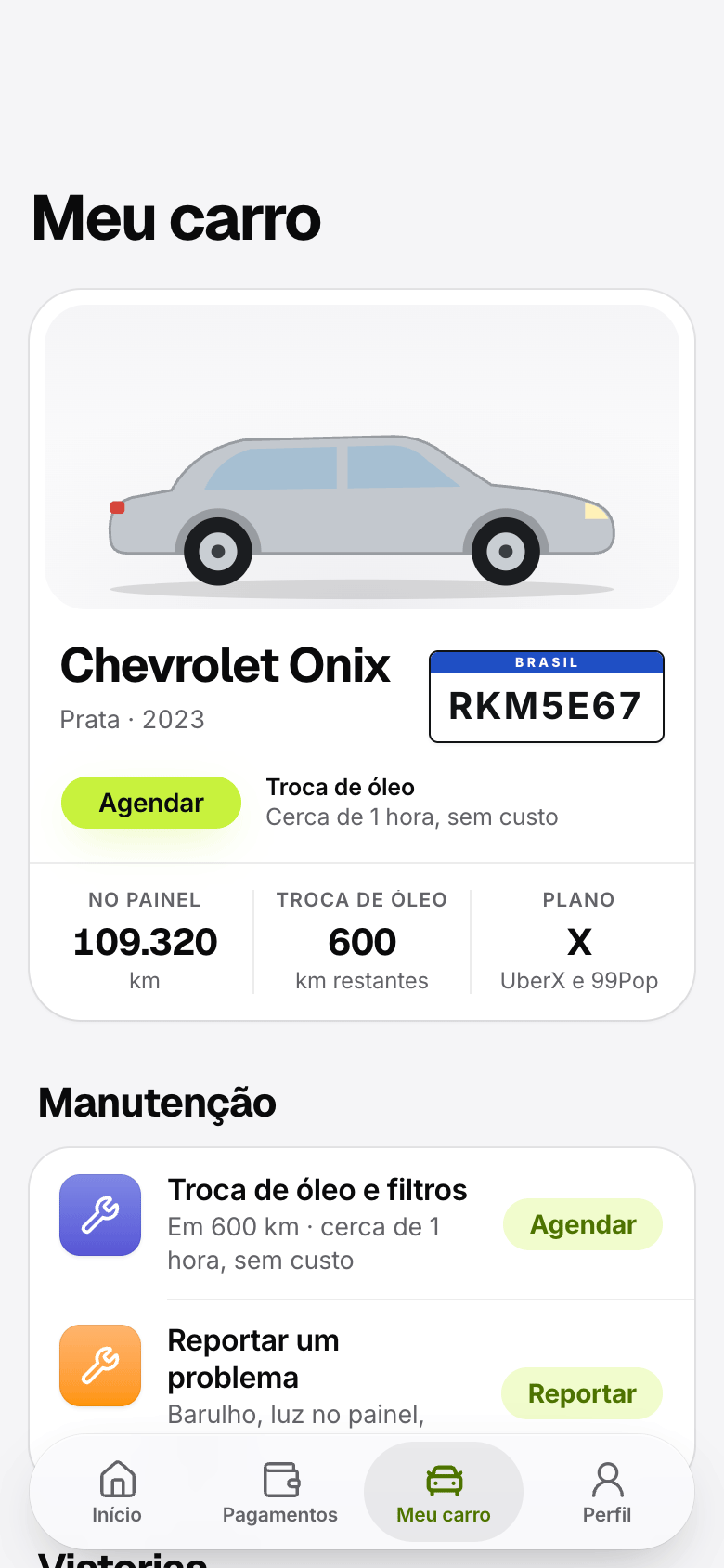 Tela Meu carro do app: o carro, a placa, a revisão e a manutenção